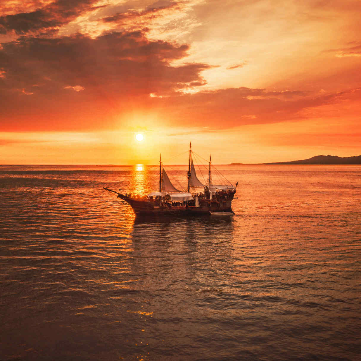 pirate ship at sunset